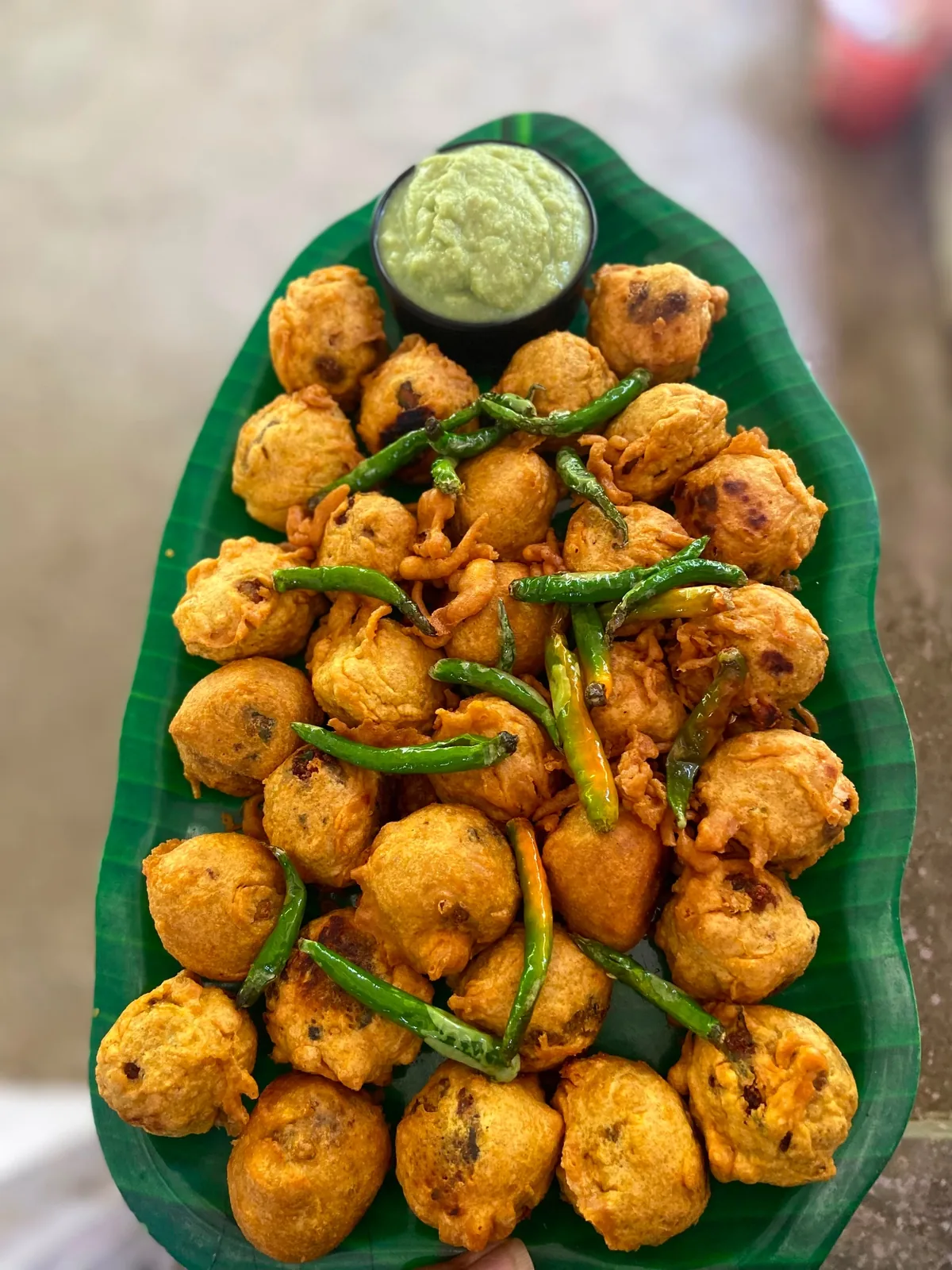 Crispy bhajji fritters with green chutney